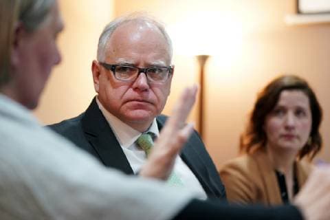 March 14, 2019 - St. Cloud, MN, USA - Gov. Tim Walz talked with Catholic Charities navigator Sue Killian during a round table discussion on health care at the Mid-Minnesota Legal Aid in St. Cloud Thursday. ANTHONY SOUFFLE Ã¢â‚¬Â¢ anthony.souffle@startribune.com ....Gov. Tim Walz held a press conference and round table to discuss the health care pieces of his budget Thursday, March 14, 2019 in St. Cloud, Minn. St. Cloud USA - ZUMAm42_ 20190314_zaf_m42_028 Copyright: xAnthonyxSoufflex