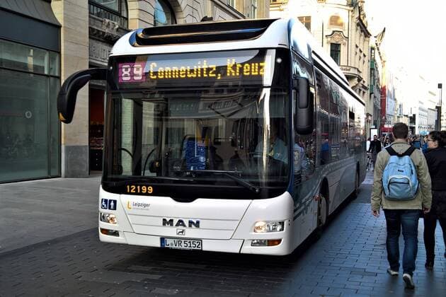 MAN Omnibus or public bus of the Leipzig public transportation company The bus travels through the pedestrian zone of Leipzig