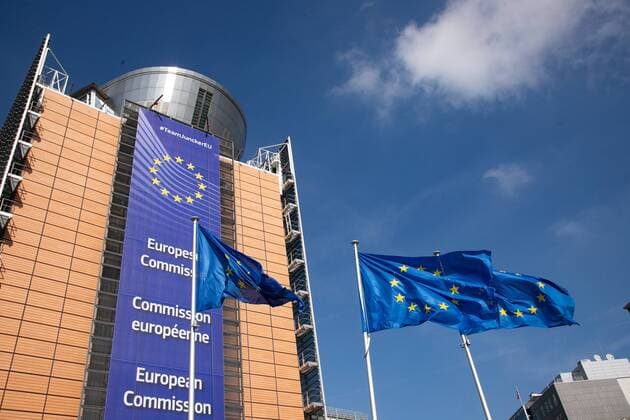 March 21, 2019 - Brussels, Belgium - Flag of Europe in front of Le Berlaymont headquarters of the European Commission - European Union EU. The flag was designed by ArsoÂ¨ne Heitz and Paul M. G. Levy. March 21, 2019 - Brussels, Belgium. Brussels Belgium  - ZUMAn230 20190321_zaa_n230_1178 Copyright: xNicolasxEconomoux
