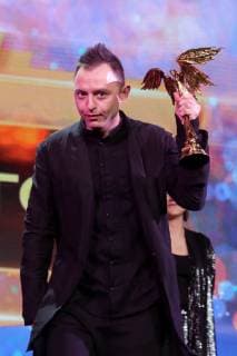 MOSCOW, RUSSIA â€“ MARCH 30, 2019: Musician and actor Roma Zver accepts an award for Breakthrough Actor for his role in Kirill Serebrennikov s film Leto Summer at the 32nd Nika Film Award Ceremony. Vyacheslav Prokofyev TASS  TS0A66E7