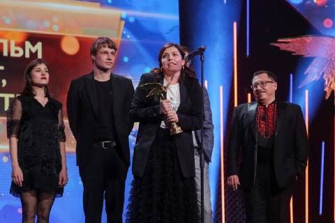 MOSCOW, RUSSIA â€“ MARCH 30, 2019: Director Darya Zhuk (C) accepts an award for Best CIS, Georgia, and Baltic States Film for her movie The Crystal Swan at the 32nd Nika Film Award Ceremony. Vyacheslav Prokofyev TASS  TS0A66F2