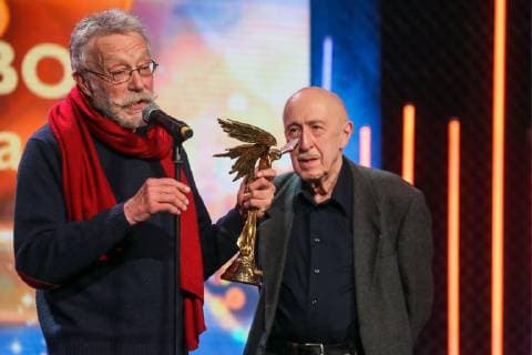MOSCOW, RUSSIA â€“ MARCH 30, 2019: Journalist Yuri Rost (L) and director Otar Iosseliani, the winner of a special prize Honour and Dignity , at the 32nd Nika Film Award Ceremony. Vyacheslav Prokofyev TASS  TS0A6772