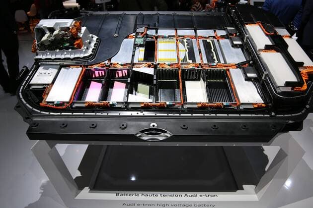 Battery Cutaway model of the electric car Audi e tron The lithium ion battery consists of 36 cell modules in a shoe box Size in which 12 pouch cells 60 Ah cells Battery cells are located 89 International Motor Show Geneva CH 2019 07 17 03 2019 Geneva International Motor Show Motor Show Auto Messe Palexpo Geneve Switzerland Press Day 05 03 2019