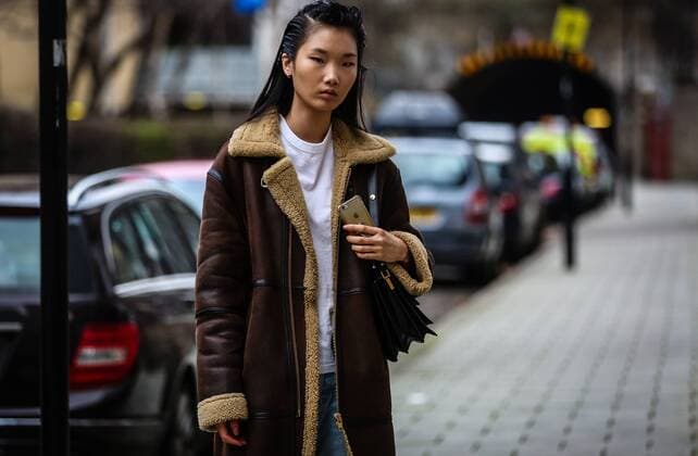 UK: On the street London LONDON, UK- February 17 2019: Model on the street during the London Fashion Week. London United Kingdom  MauroxDelxSignore
