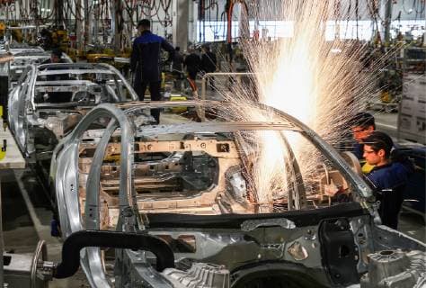 MOSCOW REGION, RUSSIA - APRIL 3, 2019: Workers welding in an assembly room of a Mercedes-Benz plant of the Daimler AG German automotive corporation in the Yesipovo industrial park. Sergei Bobylev TASS  TS0A6BEA