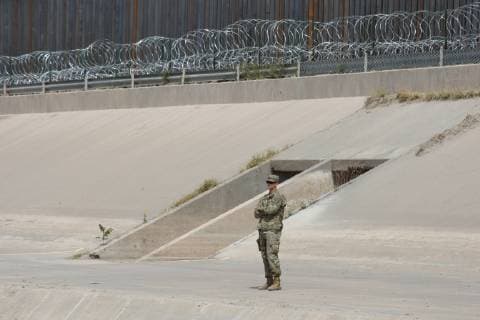 Mexico: Army of USA arrived at the border between Juarez and El Paso Soldiers from the United States, arrived at the border between Juarez and El Paso, Texas, United States, to take care of the frontier border, of the migrants, installed barbed wire near the wall that divides both countries Juarez Chihuahua Mexico  DavidxPeinado