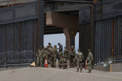 Mexico: Army of USA arrived at the border between Juarez and El Paso Soldiers from the United States, arrived at the border between Juarez and El Paso, Texas, United States, to take care of the frontier border, of the migrants, installed barbed wire near the wall that divides both countries Juarez Chihuahua Mexico  DavidxPeinado