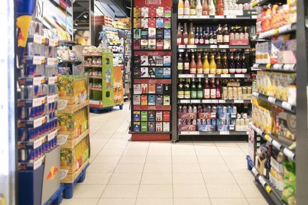 Drinks department in a supermarket Bonn 27 03 2019 Display with vouchers next to shelves with drinks Bonn Germany Copyright: xUtexGrabowskyx xphotothek.netx