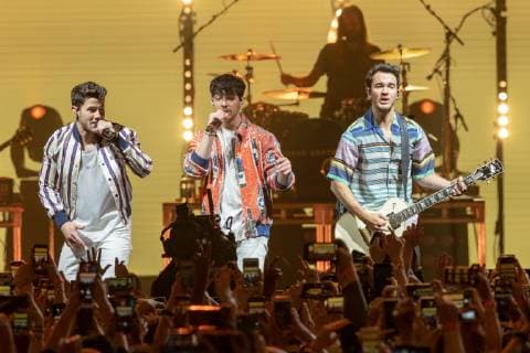 April 6, 2019 - Minneapolis, Minnesota, U.S - NICK JONAS, JOE JONAS and KEVIN JONAS of the Jonas Brothers during the NCAA March Madness Music Series at The Armory in Minneapolis, Minnesota Minneapolis U.S. - ZUMAs135 20190406_zap_s135_030 Copyright: xDanielxDeSloverx