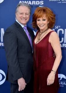 Skeeter Lasuzzo (L) ad Reba McEntire attend the 54th annual Academy of Country Music Awards held at the MGM Grand Garden Arena in Las Vegas, Nevada on April 7, 2019. The show will broadcast live on CBS.  LAP20190407194 JIMxRUYMEN