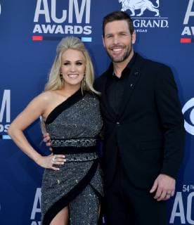 Carrie Underwood and Mike Fisher attend the 54th annual Academy of Country Music Awards held at the MGM Grand Garden Arena in Las Vegas, Nevada on April 7, 2019. The show will broadcast live on CBS.  LAP20190407347 JIMxRUYMEN