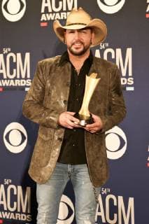April 7, 2019 - Las Vegas, Nevada, United States - Jason Aldean holds the trophy for receiving the ACM Dick Clark Artist of the Decade Award at the 54th Academy of Country Music Awards at MGM Grand Arena in Las Vegas, Nevada. Las Vegas United States - ZUMAw109 20190407_zap_w109_055 Copyright: xDebbyxWongx