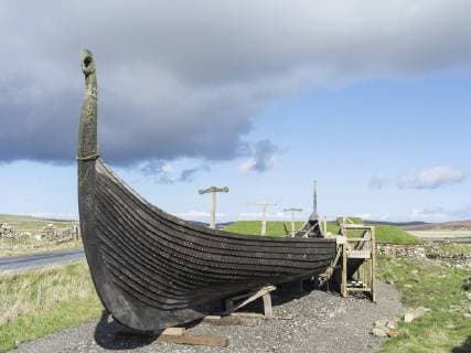 The island of Unst, Replica of a viking vessel near Haroldswick. The ship was sailed from Sweden to Shetland in the year 2000 and is now owned by the Shetland Amenity Trust and is part of the Viking Unst Project. europe, central europe, northern europe, united kingdom, great britain, scotland, northern isles,shetland islands, May  Copyright: xMartinxZwickx EU36 MZW0211