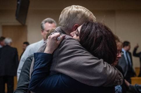April 12, 2019 - Albuquerque, New Mexico, U.S. - .Michelle Carlino-Webster(Cq), hugs form APD Chief Gorden Eden(Cq) after Accused cop killer Davon Lymon(Cq) was found guilty in Judge Neil Candelaria s courtroom Friday afternoon. Lymon was accused of killing her husband APD officer Daniel Webster..Albuquerque, New Mexico Journal Albuquerque U.S. - ZUMAab1_ 20190412_zaf_ab1_013 Copyright: xRobertoxE.xRosalesx