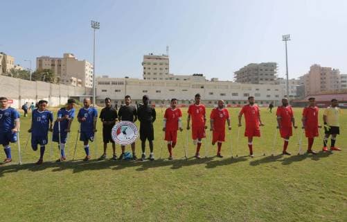 April 13, 2019 - Gaza City, Gaza Strip, Palestinian Territory - Palestinian amputees using crutches play a football match during the first football tournament for amputees, at Palestine Stadium in Gaza city, on April 13, 2019. More than 125 have had amputations shot by Israeli forces during a year of weekly mass protests along the Gaza border, according to Palestinian figures Gaza City Palestinian Territory - ZUMAap3_ 20190413_zaf_ap3_083 Copyright: xAshrafxAmrax