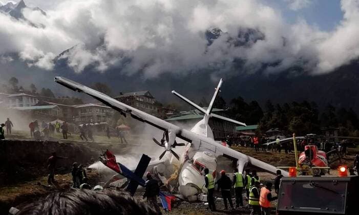 News Themen der Woche KW15 News Bilder des Tages (190414) -- SOLUKHUMBU, April 14, 2019 -- Photo taken on April 14, 2019 shows the site of aircraft collision at Lukla airport in Solukhumbu, Nepal. At least two people were killed after an aircraft of Summit Air collided with a helicopter at Lukla Airport in Nepal on Sunday morning, according to local authorities. NEPAL-SOLUKHUMBU-LUKLA AIRPORT-AIRCRAFT CRASH sunilxsharma 