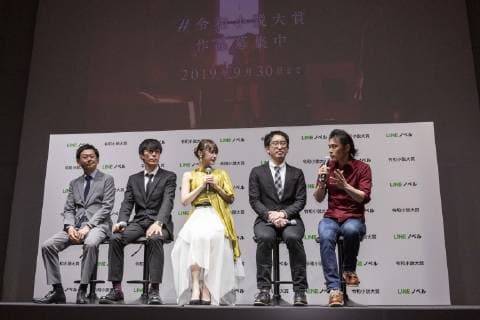 April 16, 2019 - Tokyo, Japan - (L to R) Hiroshi Mori Executive Officer of LINE Corp., Yuma Takahashi producer of Aniplex, Japanese idol Kazumi Takayama, Hiroyuki Ueno Producer of Nippon Television Network Corp. and Kazuma Miki CEO of Straight Edge Inc., speak during a news conference to announce a new service Line Novel and the Reiwa Novel Award which aims users to participate on its first novel contest sending their creations through their app from April 16 to September 30. Tokyo Japan - ZUMAm191 20190416_zap_m191_036 Copyright: xRodrigoxReyesxMarinx