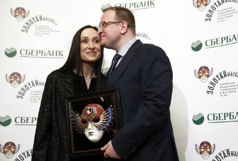 MOSCOW, RUSSIA - APRIL 16, 2019: Actress Audrey Bonnet (L) and Andrei Borisov, executive director of the Perm Opera and Ballet Theatre, receive the Opera Best Production award for the Jeanne au Bucher production by the Perm Opera and Ballet Theatre at the 2019 Golden Mask award ceremony at the Historic Stage of the Bolshoi Theatre. Artyom Geodakyan TASS  TS0A86DD