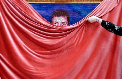 ST PETERSBURG, RUSSIA - APRIL 18, 2019: Unveiling a 15kg picture showing a likeness of Ukraine s presidential candidate Volodymyr (Vladimir) Zelensky made from some 3,000 Roshen sweets at Sladky (Sweet) Museum at Nevsky Prospekt in St Petersburg; Roshen is a confectionery corporation owned by Ukraine s incumbent president Poroshenko who is also taking part in the 2019 Ukrainian presidential election. Alexander Demianchuk TASS  TS0A8A14