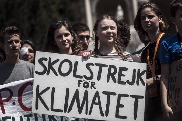 Italy: Global Climate Strike for Future in Rome Swedish climate change activist Greta Thunberg speaks during the Fridays For Future rally in Piazza del Popolo to demand action to prevent further global warming and climate change. Rome Latium Italy Piazza del Popolo  GiuseppexCiccia