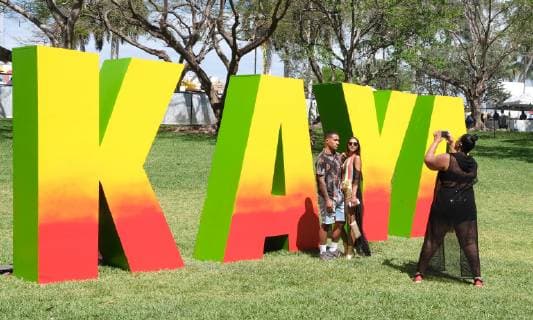 Rasta fans pose for a photo at the KAYA music fest at Bayfront park in Miami, Florida on April 20, 2019.  MIA20190420115 GARYxIxROTHSTEIN
