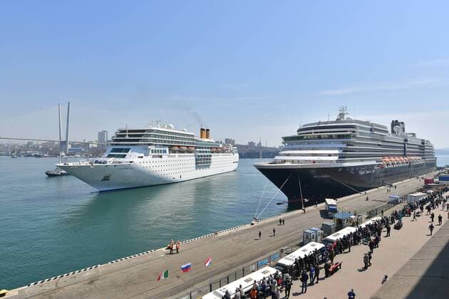 VLADIVOSTOK, RUSSIA - APRIL 22, 2019: The Westerdam cruise ship (R) operated by Holland America Line and the Costa NeoRomantica cruise ship operated by Costa Crociere in the port of Vladivostok on Russia s Pacific coast. Yuri Smityuk TASS  TS0A91BD