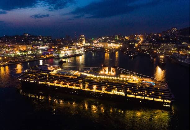 VLADIVOSTOK, RUSSIA - APRIL 22, 2019: The Westerdam cruise ship (front) operated by Holland America Line unberthing at the port of Vladivostok on Russia s Pacific coast. Yuri Smityuk TASS  TS0A9238