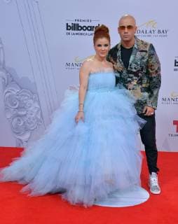 Wisen (R) and Yomaira Ortiz Feliciano attend the 26th annual Billboard Latin Music Awards at the Mandalay Bay Events Center in Las Vegas, Nevada on April 25, 2019.  LAV20190425055 JIMxRUYMEN