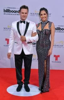 (L-R) Mark Tacher and Cynthia Alesco attend the 26th annual Billboard Latin Music Awards at the Mandalay Bay Events Center in Las Vegas, Nevada on April 25, 2019.  LAV20190425515 JIMxRUYMEN