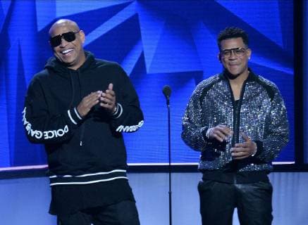 Alexander Delgado (R) and Randy Malcolm present an award onstage during the 26th annual Billboard Latin Music Awards at the Mandalay Bay Events Center in Las Vegas, Nevada on April 25, 2019.  LAV20190425400 JIMxRUYMEN