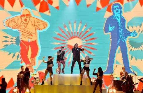 Wisin and Carlos Vives (R) perform during the 26th annual Billboard Latin Music Awards at the Mandalay Bay Events Center in Las Vegas, Nevada on April 25, 2019.  LAV20190425408 JIMxRUYMEN