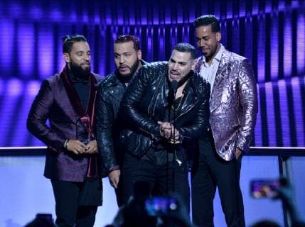 Lenny Santos,Max Santos, Henry Santos and Romeo Santos, of Aventura, accept the Tropical Artist of the Year, Duo or Group award during the 26th annual Billboard Latin Music Awards at the Mandalay Bay Events Center in Las Vegas, Nevada on April 25, 2019.  LAV20190425471 JIMxRUYMEN