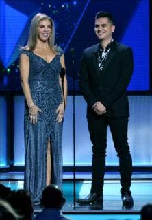 Leila Cobo and Regulo Caro present an award onstage during the 26th annual Billboard Latin Music Awards at the Mandalay Bay Events Center in Las Vegas, Nevada on April 25, 2019.  LAV20190425496 JIMxRUYMEN