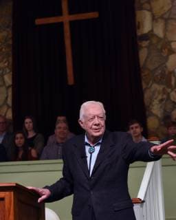 April 28, 2019 - Plains, Georgia, United States - Former U.S. President Jimmy Carter speaks to the congregation at Maranatha Baptist Church before teaching Sunday school in his hometown of Plains, Georgia on April 28, 2019. Carter, 94, has taught Sunday school at the church on a regular basis since leaving the White House in 1981, drawing hundreds of visitors who arrive hours before the 10:00 am lesson in order to get a seat and have a photograph taken with the former President and former First Lady Rosalynn Carter. Plains United States  - ZUMAn230 20190428_zaa_n230_1313 Copyright: xPaulxHennessyx