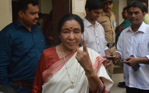 MUMBAI, INDIA - APRIL 29: Bollywood singer Asha Bhosle shows her ink-marked finger after casting her vote in the fourth phase of the ongoing Lok Sabha elections, on April 29, 2019 in Mumbai, India. (Photo by Bhushan Koyande Hindustan Times) Lok Sabha Elections 2019 775335113