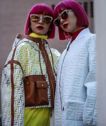MILAN, Italy- February 21 2019: Ami Suzuki and Aya Suzuki on the street during the Milan Fashion Week.  MauroxDelxSignore