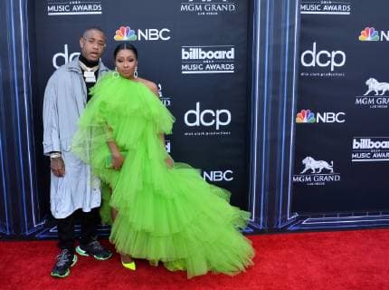 Southside (L) and Yung Miami arrive for the 2019 Billboard Music Awards at the MGM Grand Garden Arena in Las Vegas, Nevada on May 1, 2019.  LAV20190501088 JIMxRUYMEN