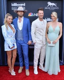 (L-R) Brittney Marie Cole Kelley, Brian Kelley and Tyler Hubbard of Florida Georgia Line, and Hayley Stommel Hubbard arrive for the 2019 Billboard Music Awards at the MGM Grand Garden Arena in Las Vegas, Nevada on May 1, 2019.  LAV20190501167 JIMxRUYMEN