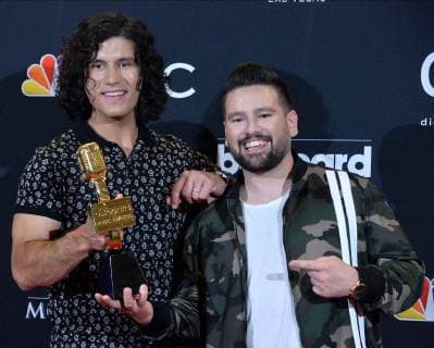 (L-R) Dan Smyers and Shay Mooney of Dan + Shay appear backstage after winning the award for Top Country Duo Group during the 2019 Billboard Music Awards at the MGM Grand Garden Arena in Las Vegas, Nevada on May 1, 2019.  LAV20190501192 JIMxRUYMEN