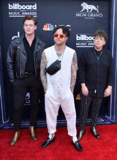 (L-R) Jordan Greenwald, Mitchy Collins, and Sam Price of lovelytheband arrive for the 2019 Billboard Music Awards at the MGM Grand Garden Arena in Las Vegas, Nevada on May 1, 2019.  LAV20190501258 JIMxRUYMEN