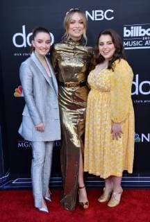 (L-R) Kaitlyn Dever, Olivia Wilde and Beanie Feldstein arrive for the 2019 Billboard Music Awards at the MGM Grand Garden Arena in Las Vegas, Nevada on May 1, 2019.  LAV20190501294 JIMxRUYMEN