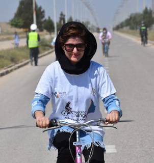 (190502) -- BALKH, May 2, 2019 -- A girl takes part in an cycling event in Mazar-i-Sharif, capital of Balkh province, Afghanistan, May 2, 2019 . ) (SP)AFGHANISTAN-BALKH-GIRLS-CYCLING KawaxBasharat 