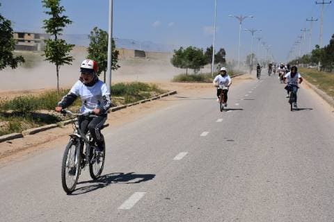 (190502) -- BALKH, May 2, 2019 -- Girls take part in an cycling event in Mazar-i-Sharif, capital of Balkh province, Afghanistan, May 2, 2019 . ) (SP)AFGHANISTAN-BALKH-GIRLS-CYCLING KawaxBasharat 