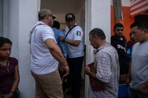 Migrants enter INM s Regional Sub-delegation office in Tapachula, Mexico after their name is called to discuss having the proper paperwork to travel freely in Mexico without fear of deportation on May 6, 2019. Some migrants enter Mexico at this southern border town and then travel freely north to the United States border.  TP20190506109 ARIANAxDREHSLER