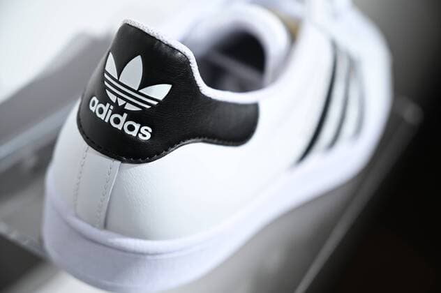 FUERTH, GERMANY, 09 May 2019 --- Hauptversammlung der adidas AG --- Annual General Meeting adidas AG --- at Stadthalle in Fuerth, Germany --- Der Schuh Superstar des Sportartikelherstellers adidas ist am Rande der Hauptversammlung des Unternehmens ausgestellt. Dieses Schuhmodell feiert 2019 seinen 50. Geburtstag. Adidas wird 2019 70 Jahre alt. --- adidas shoe Superstar is exhibited during the company s AGM. 2019 marks the 50th birthday as well as the company s 70th anniversary. ---Foto: isslerimages --- adidas Annual General Meeting
