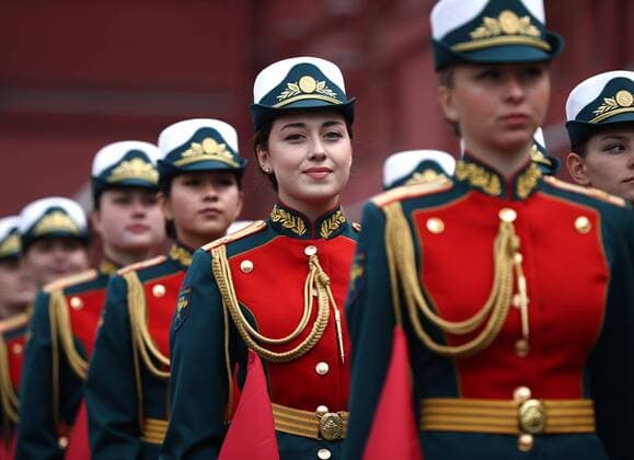 MOSCOW, RUSSIA - MAY 9, 2019: Servicewomen ahead of a ceremony to lay flowers at the Tomb of the Unknown Soldier by the Kremlin Wall during celebrations marking the 74th anniversary of the victory of the Soviet Red Army over Nazi Germany in the Great Patriotic War of 1941-45, the Eastern Front of the Second World War. Mikhail Tereshchenko TASS  TS0AAF6A