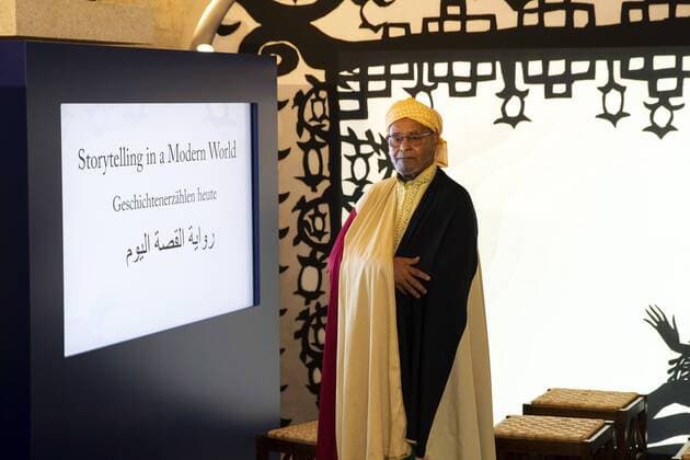 Storyteller El Haj Ahmed Ezzarghani at the exhibition Cinderella, Sindbad Sinuhe Arabic German narrative traditions at the Egyptian Museum in Berlin on 17 April 2019 Exhibition Cinderella, Sindbad Sinuhe Arabic German narrative traditions