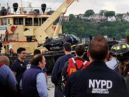 (190515) -- NEW YORK, May 15, 2019 -- Rescuers work at the site where a helicopter crashed into the Hudson River, in New York, the United States, on May 15, 2019. A helicopter fell short of the landing pad and crashed into the Hudson River in New York City on Wednesday afternoon, injuring one person on board. ) U.S.-NEW YORK-HUDSON RIVER-HELICOPTER-CRASH LixMuzi 