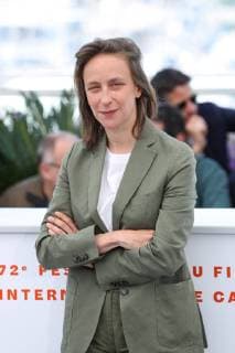 (190520) -- CANNES, May 20, 2019 (Xinhua) -- Director Celine Sciamma poses during a photocall for the film Portrait de la jeune fille en feu at the 72nd Cannes Film Festival in Cannes, France, May 20, 2019. French director Celine Sciamma s film Portrait de la jeune fille en feu will compete for the Palme d Or at the 72nd Cannes Film Festival. (Xinhua Zhang Cheng) FRANCE-CANNES-FILM FESTIVAL 