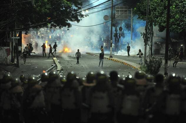 (190522) -- JAKARTA, May 22, 2019 -- Protesters are seen during a clash in Jakarta, Indonesia, May 22, 2019. Jakarta Governor Anies Baswedan said on Wednesday the clashes between police and demonstrators that occurred around 5 hours from midnight until morning has killed 6 persons, injured around 200 others. The clashes between police and protesters who rejected results of presidential election occurred in several spots in downtown central Jakarta area, near the election supervisory body (Bawaslu) building. ) INDONESIA-JAKARTA-ELECTION-PROTEST Zulkarnain 